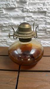 lot 166 image: Oil Lamp with Amber Glass Globe and Metal Burner