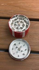 lot 195 image: Brand new Red Poker Chip themed tobacco Grinder