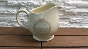 lot 214 image: Pfaltzgraff Ceramic PitcherGravy Boat in the Tea Rose Pattern with General Store Graphic