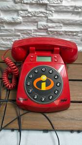 lot 220 image: The Incredibles Red Rotary Dial Telephone with LCD Display