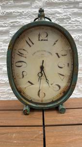 lot 279 image: Cafe des Marguerites Paris Table Clock Oval Quartz