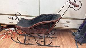 lot 334 image: Decorative Metal and Wicker Sleigh with Black Fabric Lining