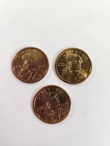 lot 122 image: Three 2000-P Sacagawea Dollar Coins&nbsp