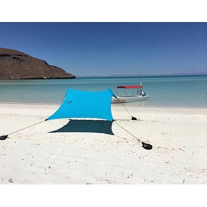 lot 18984 image: Neso Tents Beach Tent With Sand Anchor, Portable Canopy Sunshade 7 X 7 Patented Reinforced Corners(Teal) - Retail $195