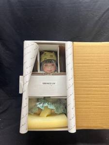 lot 230 image: Sally The John Deere Farm Girl Doll by The Danbury Mint