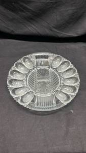 lot 268 image: Clear Glass Egg Plate with Shell-Shaped Wells and Center Handle