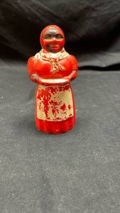 lot 279 image: Black Americana Figural Woman Shaker Red Painted Hollow Figure