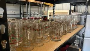 lot 283 image: Holly Christmas Drinking Glasses Lot 30 Pieces Including some Coke-Cola and Holiday Glasses from Arby��s in the ��80s