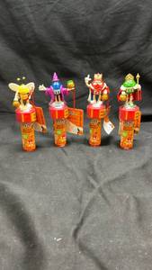lot 291 image: M&Ms Sticker Stamper Set of 4 Halloween Candy Dispensers