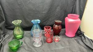 lot 298 image: Glassware Lot 9 Pieces Vases Cups Pitchers Pink Blue Green Red