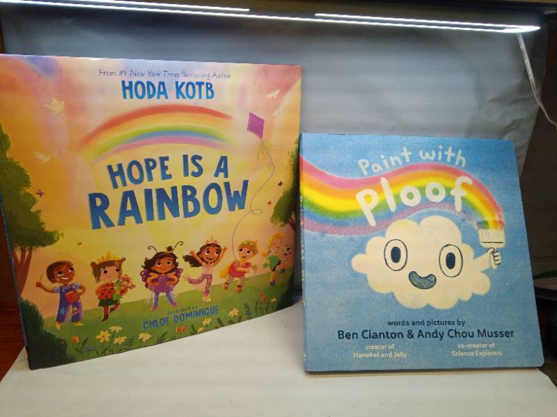 lot 1082 image: Lot of 2 Childrens Books Hope Is a Rainbow by Hoda Kotb, Paint with Ploof by Ben Clanton - Retail $38