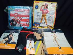 lot 1122 image: 5 Costume Lot pictured as shown Character Costume Lot Dr. Seuss Cat in the Hat Paw Patrol Hyde and Eek. There is no fire hat - Retail $80