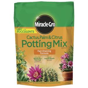 lot 1013 image: Miracle-Gro Cactus Palm Citrus Potting Soil - 8qt Enriched Mix for Indoor Plant Growth, Fast Drainage - Retail $67