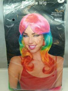 lot 1106 image: Rainbow Wig One Size Fits Most Adult Ages 14 - Retail $16