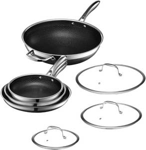lot 228 image: $599 HexClad Hybrid Nonstick 7-Piece Pan Set, 8, 10, and 12-Inch Frying Pans with Tempered Glass Lids and 12-Inch Wok, Stay-Cool Handles, Dishwasher-Friendly, Induction Ready, Compatible with All Cooktops NEW