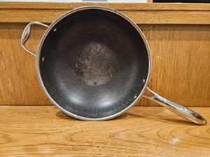 lot 241 image: $167 HexClad 12 Hybrid Nonstick Wok, Dishwasher and Oven Safe, Induction-Ready  Stay-Cool Handles, Dishwasher and Oven Safe up to 900 F, Compatible with All Cooktops
