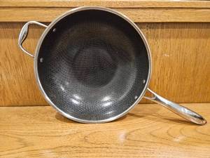 lot 244 image: $167 HexClad 12 Hybrid Nonstick Wok, Dishwasher and Oven Safe, Induction-Ready  Stay-Cool Handles, Dishwasher and Oven Safe up to 900 F, Compatible with All Cooktops