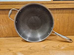 lot 245 image: $167 HexClad 12 Hybrid Nonstick Wok, Dishwasher and Oven Safe, Induction-Ready  Stay-Cool Handles, Dishwasher and Oven Safe up to 900 F, Compatible with All Cooktops