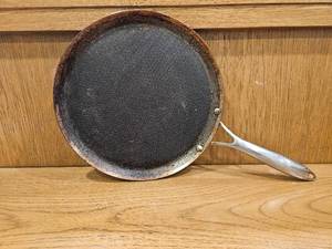 lot 250 image: $139 HexClad 12 Hybrid Nonstick Griddle Pan, BBQ, Dishwasher and Oven Safe  Stay-Cool Handles, Oven Safe up to 900 F, Compatible with All Cooktops, Induction Ready
