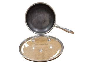 lot 255 image: $158 HexClad 10 Hybrid Nonstick Frying Pan with Lid, Dishwasher & Oven Safe  Stay-Cool Handles, Dishwasher and Oven Safe up to 900 F, Compatible with All Cooktops