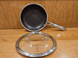 lot 261 image: $139 HexClad 8 Hybrid Nonstick Frying Pan with Lid, Dishwasher & Oven Safe  Stay-Cool Handles, Dishwasher and Oven Safe up to 900 F, Compatible with All Cooktops