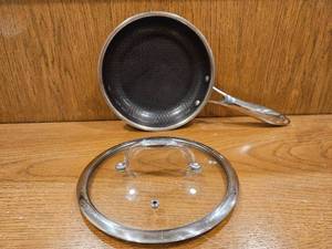 lot 263 image: $139 HexClad 8 Hybrid Nonstick Frying Pan with Lid, Dishwasher & Oven Safe  Stay-Cool Handles, Dishwasher and Oven Safe up to 900 F, Compatible with All Cooktops