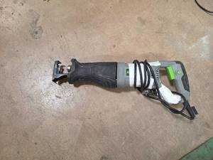 lot 7023 image: Corded Reciprocating Saw with Black Handle