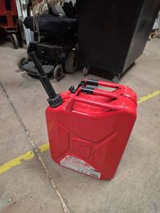 lot 7068 image: Red Metal Fuel Jerry Can with Spout