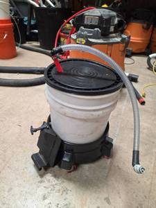 lot 7091 image: 5-Gallon Bucket Dolly with Hose Assembly