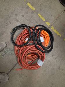 lot 7148 image: Extension Cord Set with Black & Orange Cords