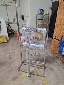 lot 7237 image: Carpet Display Rack Stand w Rolling Base garment wrapping station for bags