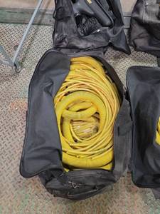 lot 7376 image: Dreau Yellow Corrugated Hose Assembly w Storage Bag