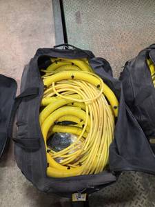 lot 7379 image: DREAL Cable Storage Bag with Yellow Conduit
