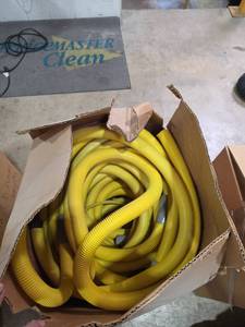 lot 7384 image: Yellow Corrugated Vacuum Hose Coil