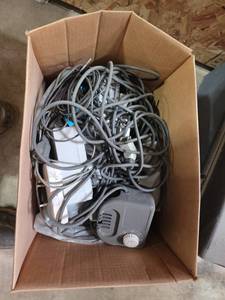 lot 7399 image: Coiled Extension Cord with Power Strip