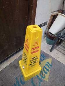 lot 7404 image: Rubbermaid Wet Floor Caution Sign Yellow