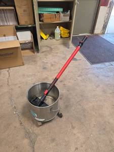 lot 7561 image: ServeMASTER Mop Bucket w Wringer & Handle