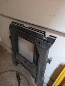 lot 7632 image: Black Plastic Fireplace Insert Frame w Accessories