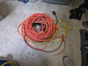 lot 7681 image: Extension Cord Reel with Multiple Colored Cords