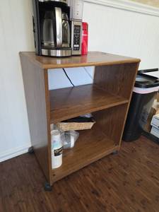 lot 7856 image: Rolling Wood Shelving Unit with Three Shelves