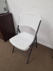 lot 7891 image: White Folding Chair with Black Frame