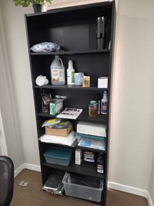lot 7916 image: Black Wooden Shelving Unit w Cleaning Supplies