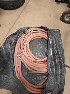 lot 7971 image: Rubber Garden Hose with Metal Fittings
