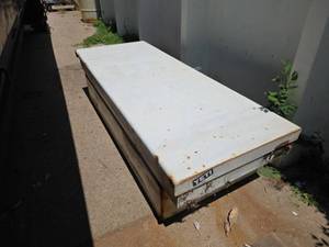 lot 7977 image: Truck Bed Box with Yeti Sticker