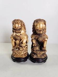 lot 88 image: Pair of Foo Dog Figurines on Wood Bases