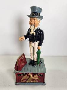 lot 89 image: Vintage 70s Cast Iron Uncle Sam Coin Bank Works