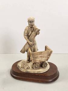 lot 154 image: Figurine Sculpture Man with Pushcart on Wood Base