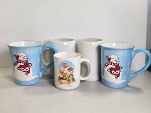 lot 216 image: Mug Lot 5-Piece Norman Rockwell Snowman Fishing