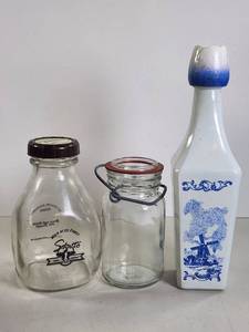 lot 222 image: Schatto Milk Company Glass Bottles and Ceramic Pitcher Lot