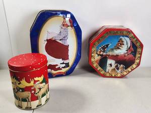 lot 275 image: Christmas Holiday Tin Lot 3pc Santa Reindeer Decorative Boxes Norman Rockwell